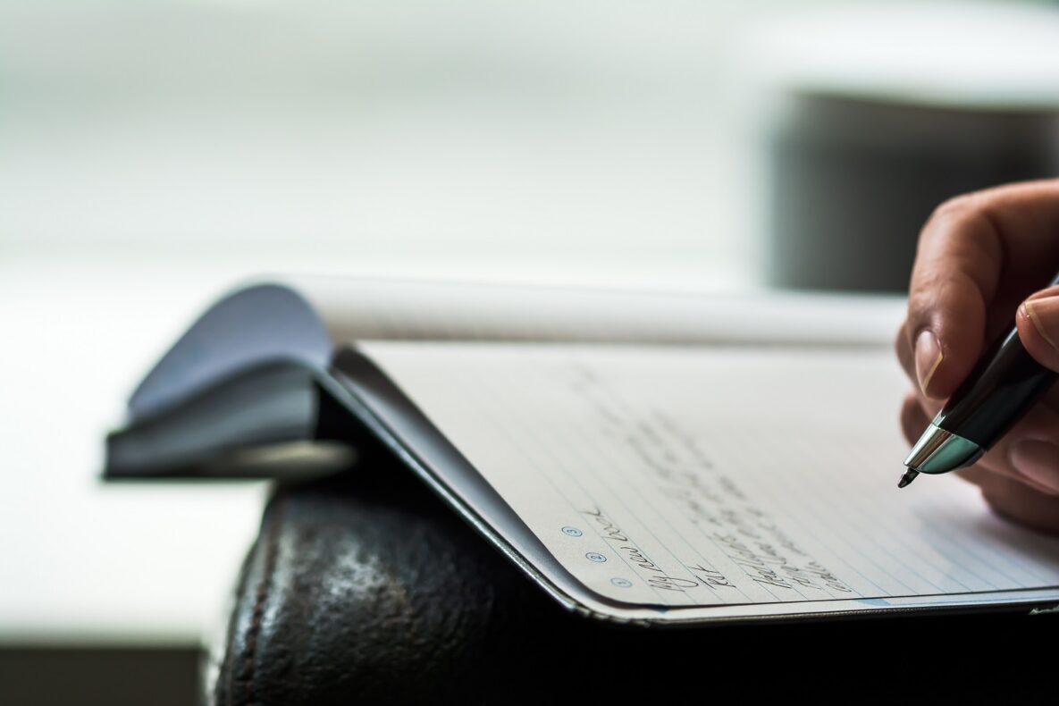A person using a smart pen.