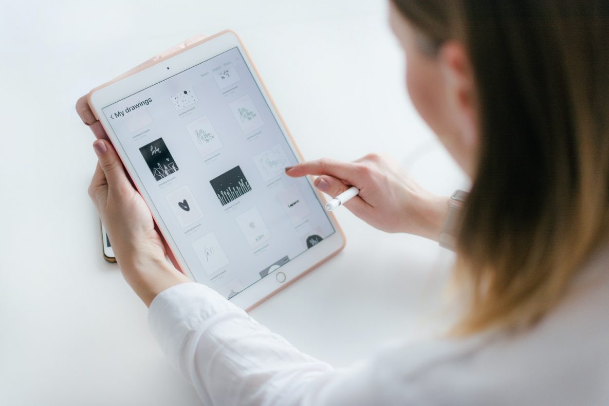 A woman using an iPad.