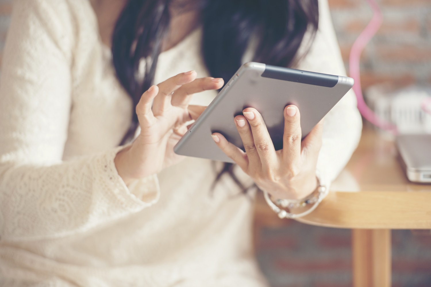 A woman using a tablet