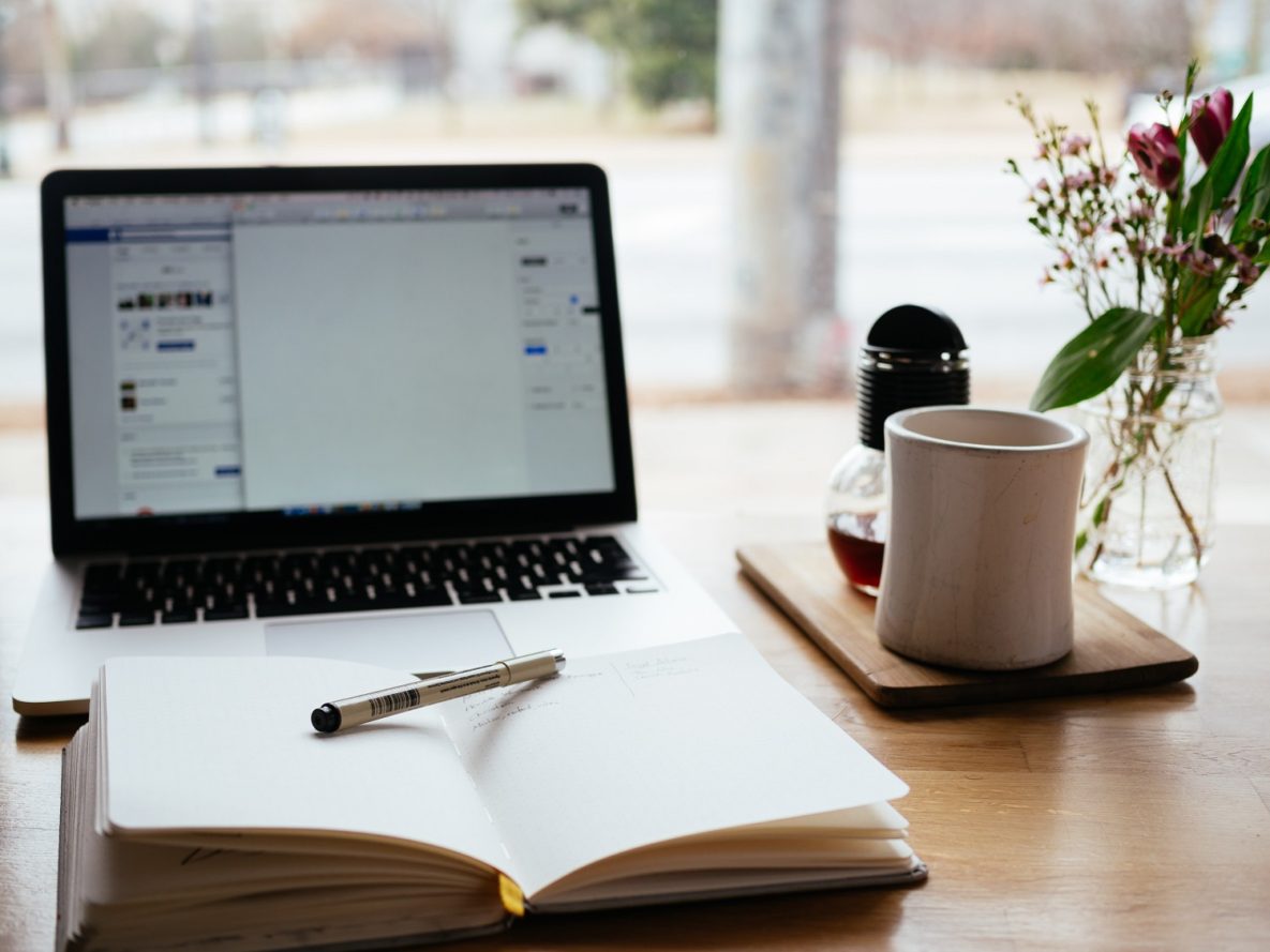 A laptop and book.