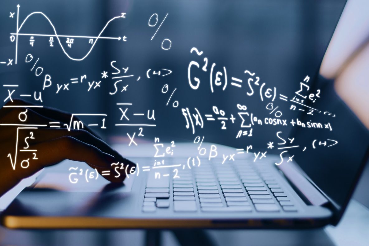 A person using their laptop for math.
