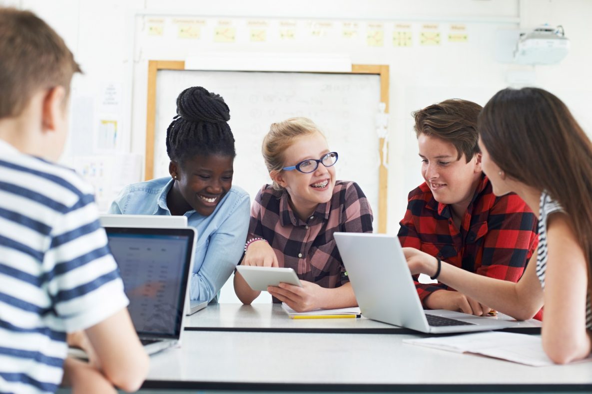 Students using AT in the classroom.