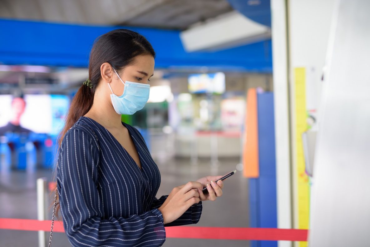 A woman using her Android smartphone.