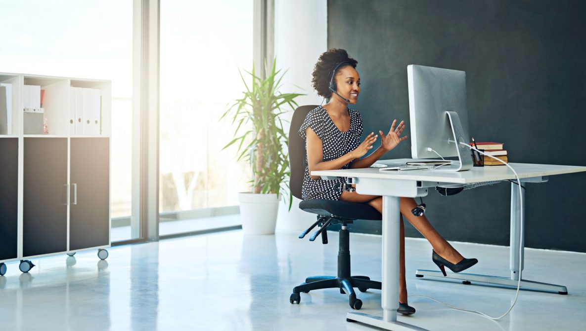 A woman video-conferencing at work.