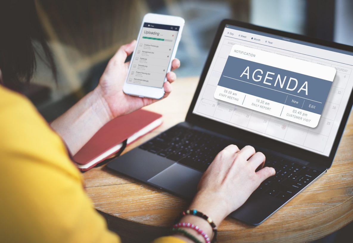 A woman using a digital agenda.