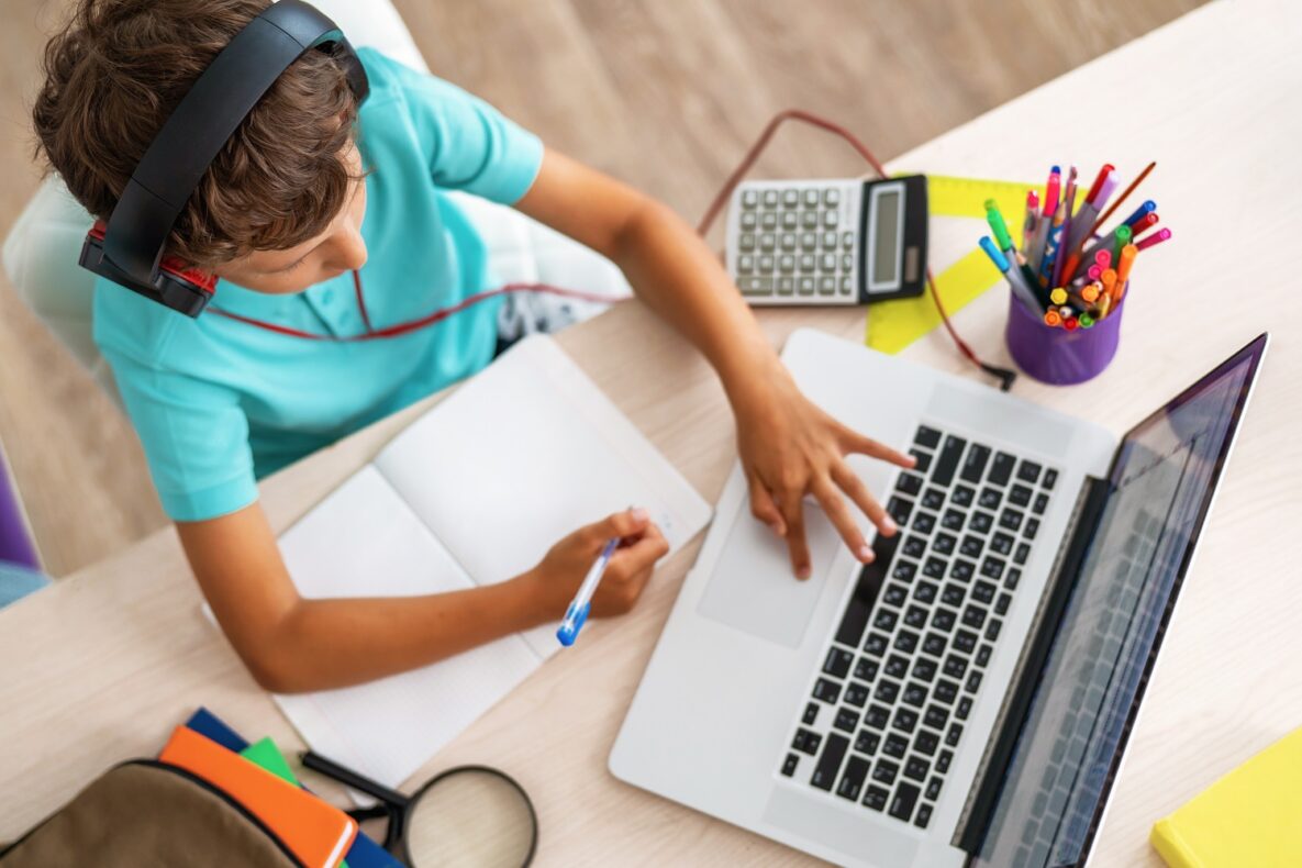 A boy using his laptop.