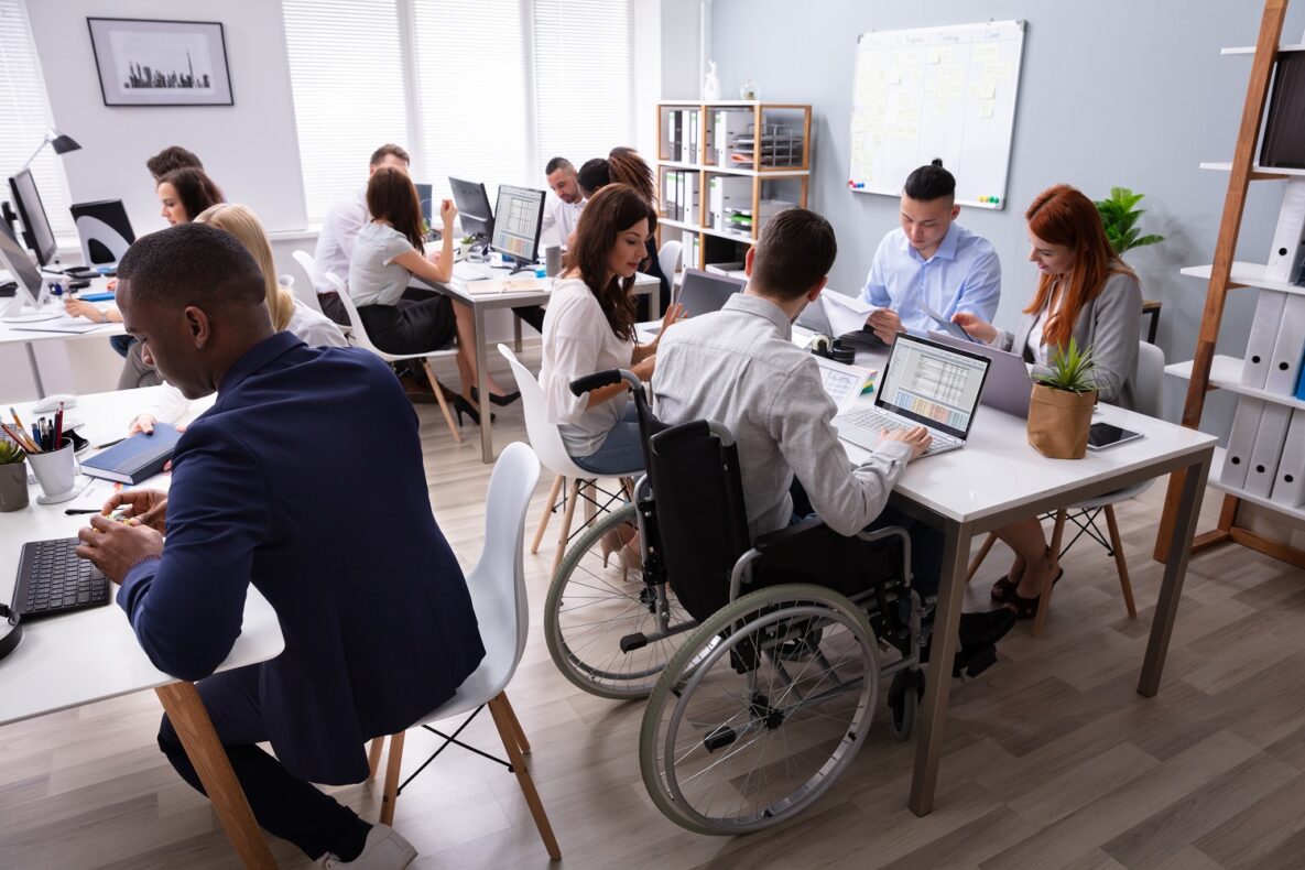 A group of people working in the office.