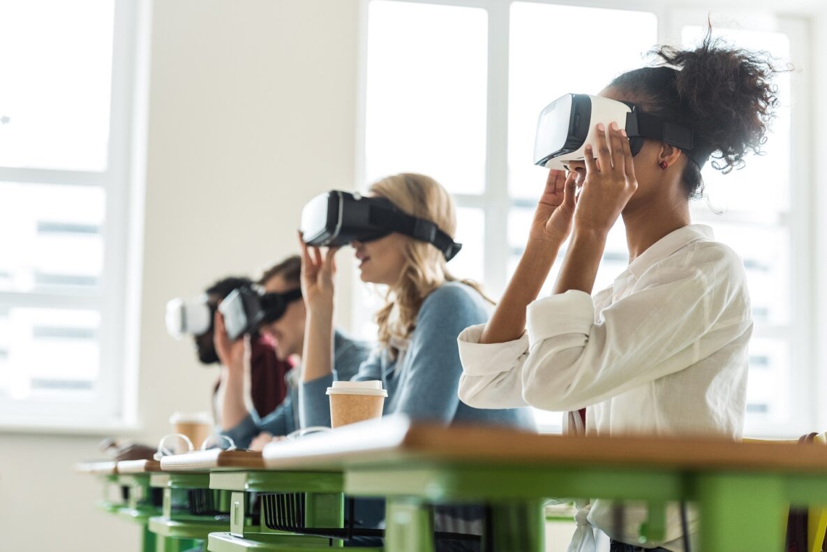 Students in class using VR headsets.