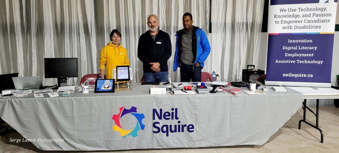 A group of Neil Squire employees at an event.