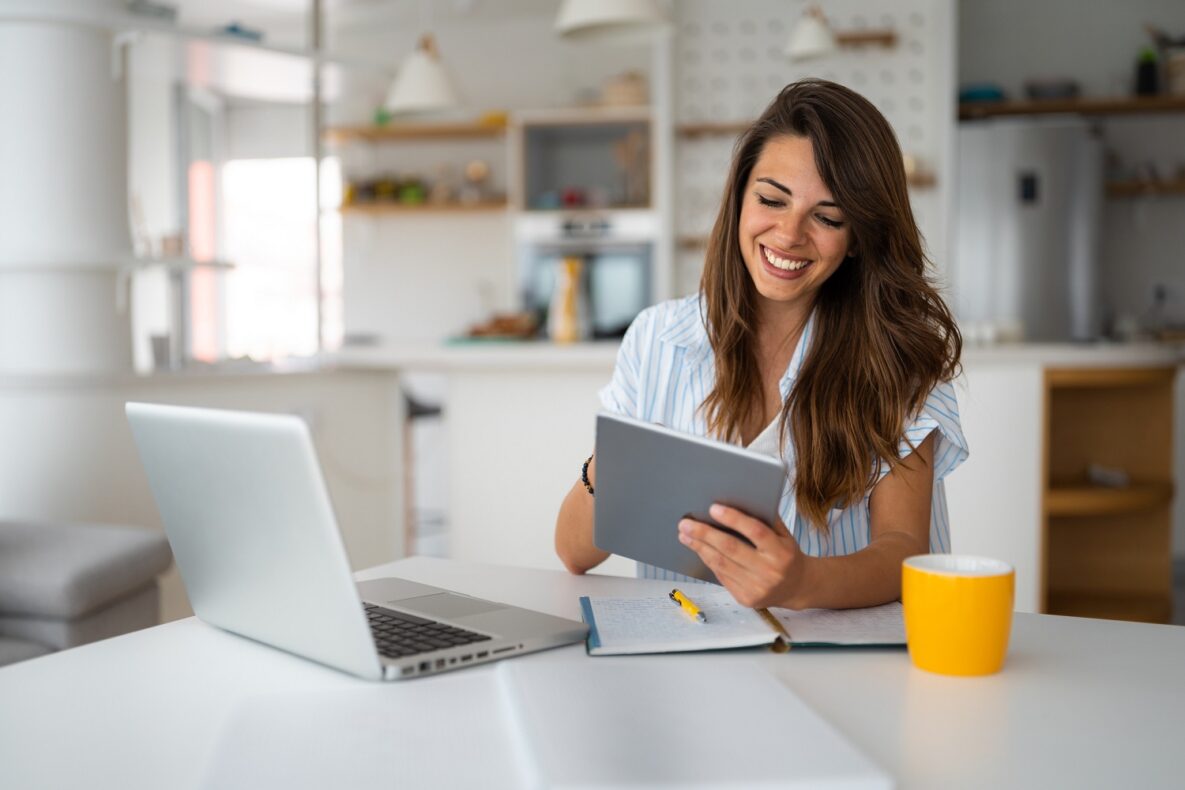 Female business person using digital tablet