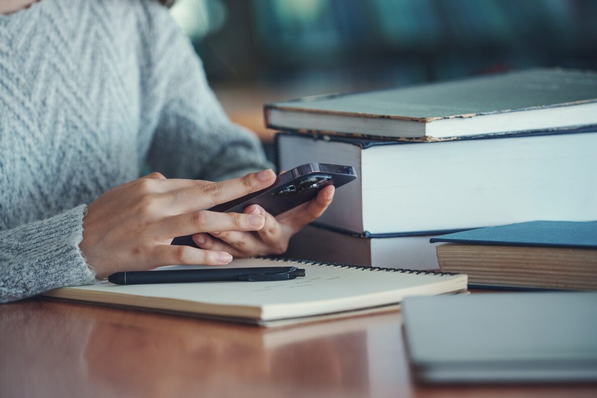 Close up of a woman using a smartphone